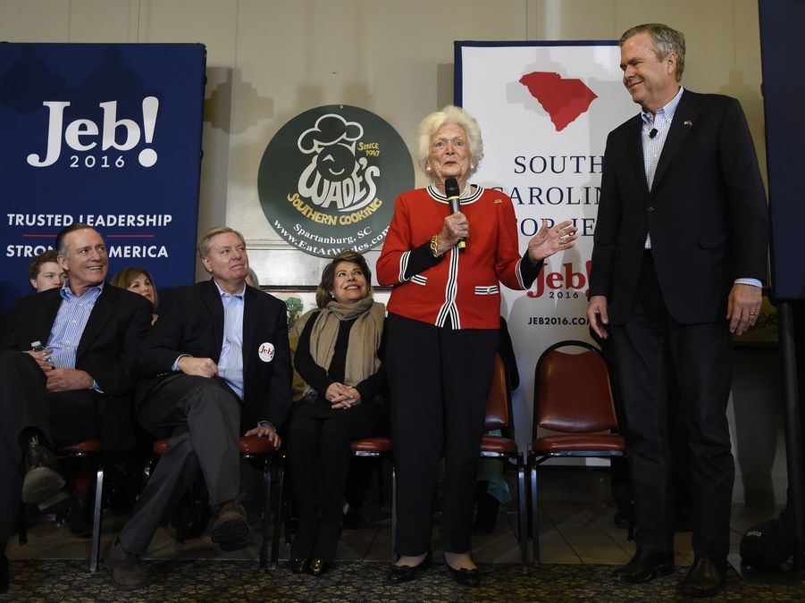 Barbara Bush speaks as her son, Republican U.S. presidential candidate Jeb Bush, looks on during a campaign event in Spartanburg, South Carolina