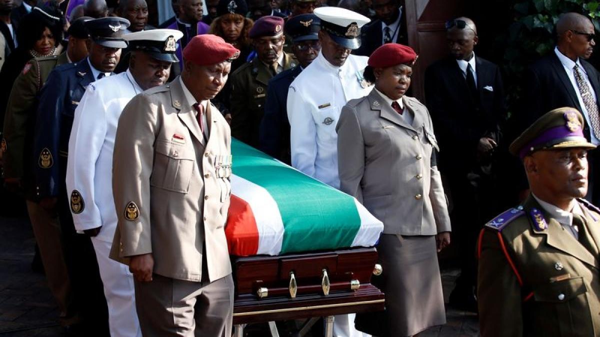The coffin of Winnie Madikizela-Mandela is carried from her home during her funeral in Soweto