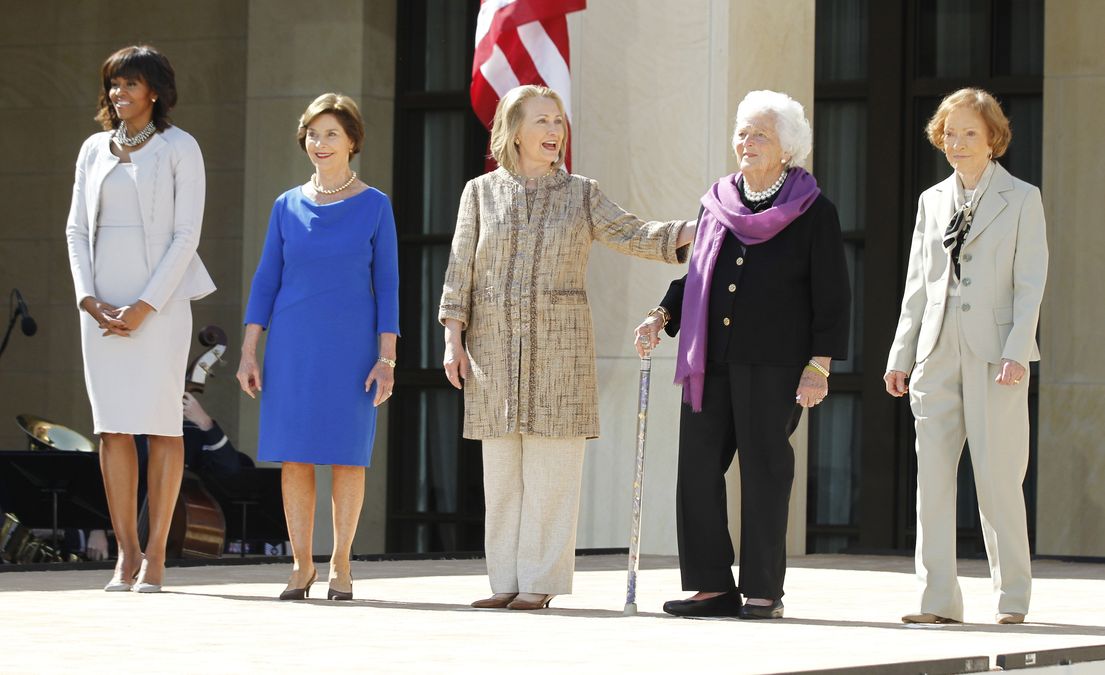 U.S. First Lady Obama poses with former first ladies as they attend the dedication ceremony for the George W. Bush Presidential Center in Dallas