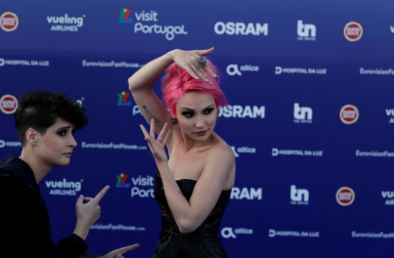 Contestant Claudia Pascoal of Portugal poses on the blue carpet during the opening party for Eurovision Song Contest at the Maat museum in Lisbon