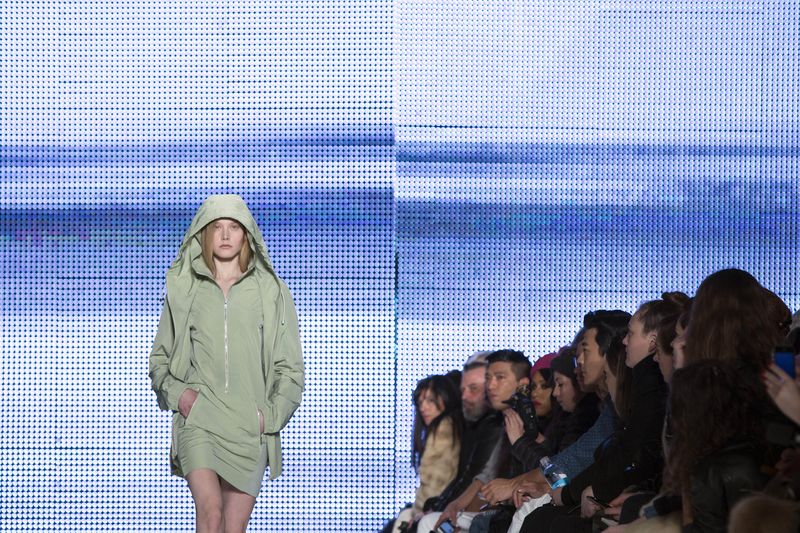 A model presents a creation from the Lacoste 2014 Fall/Winter collection during New York Fashion Week in New York