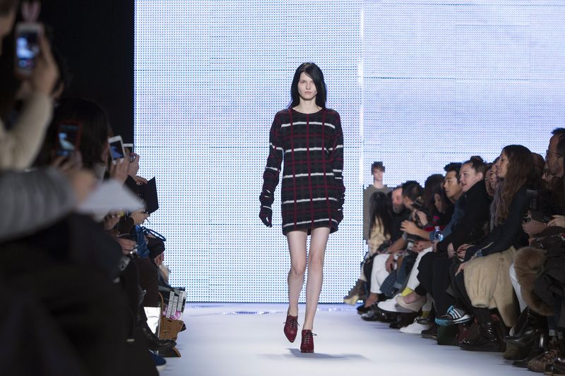 A model presents a creation from the Lacoste 2014 Fall/Winter collection during New York Fashion Week