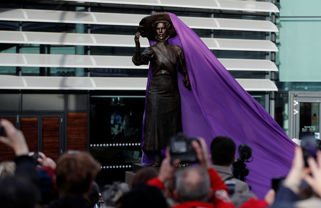 A bronze statue of suffragette Alice Hawkins is unveiled during an event to mark 100 years of votes for women in Leicester