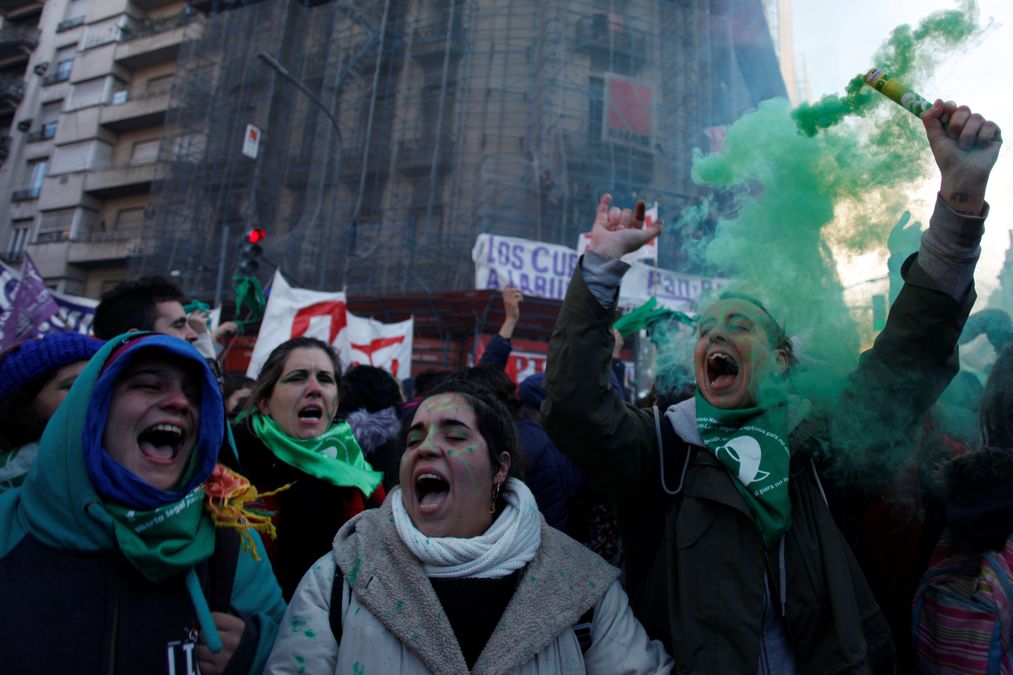 Demonstrators attend a protest in favour of legalising abortion outside the Congress while lawmakers debate an abortion bill in Buenos Aires