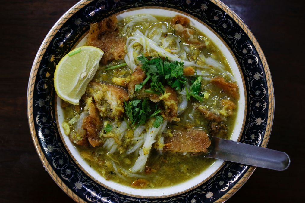 A mohinga, a traditional breakfast rice-noodle dish with fish soup, is pictured at a restaurant in Yangon