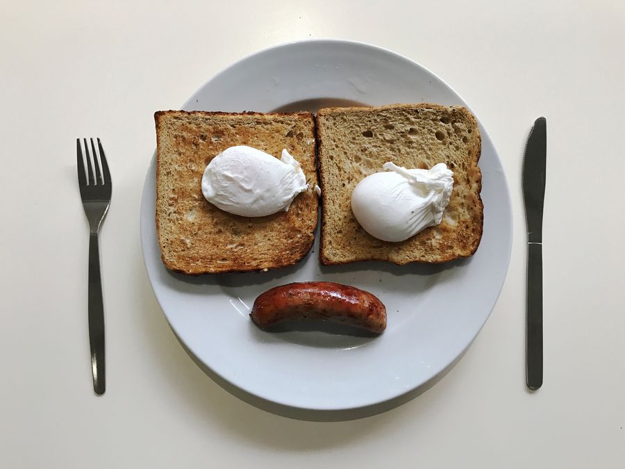 A breakfast of sausage, eggs and toast is pictured in an office canteen in London