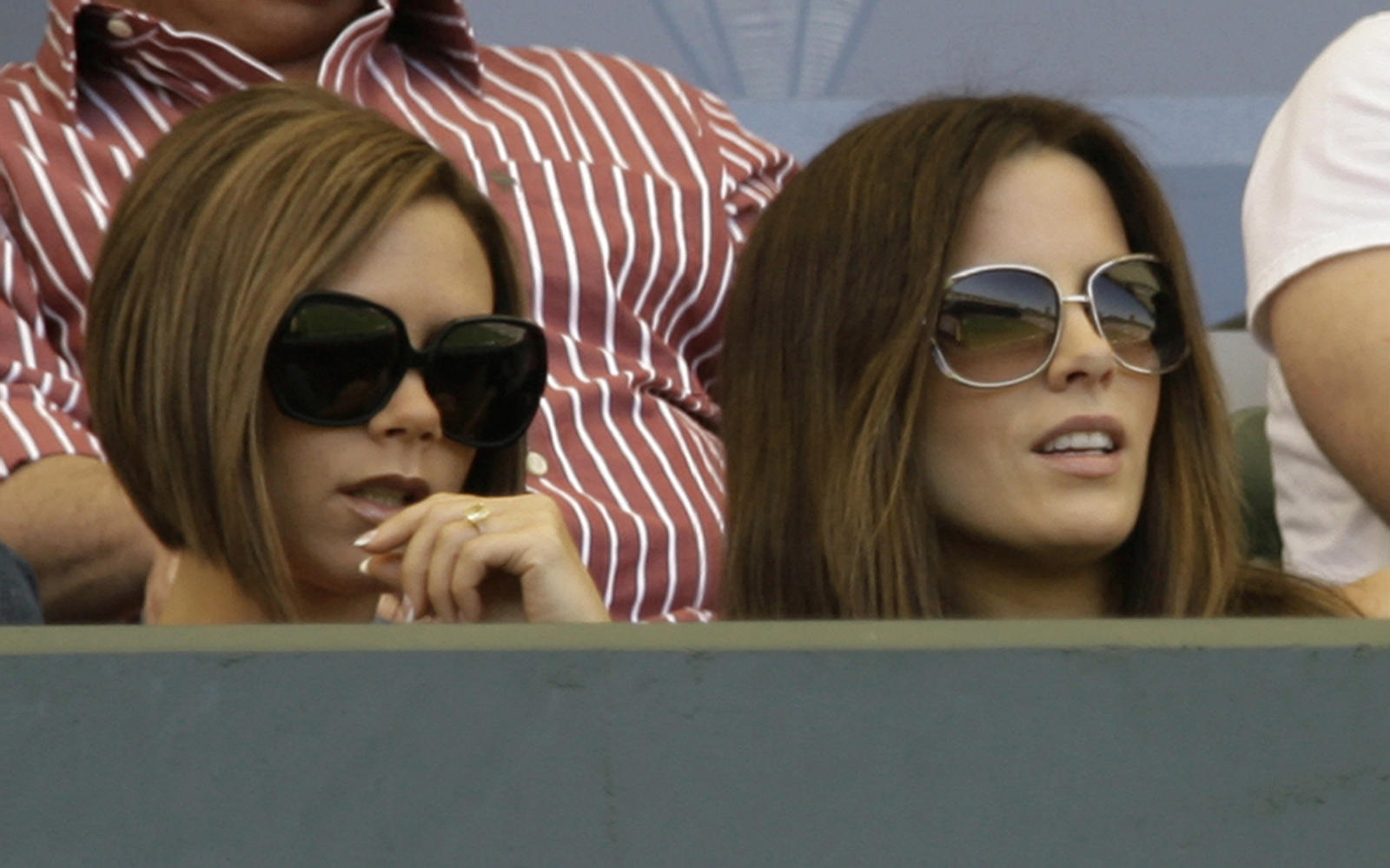 Victoria Beckham and British actress Kate Beckinsale watch as Los Angeles Galaxy’s David Beckham plays against Toronto FC in an MLS soccer match in Carson