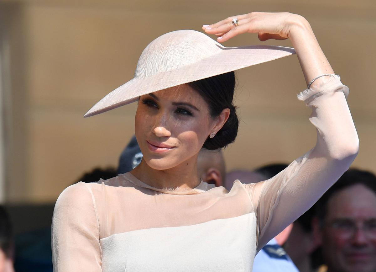 Meghan, Duchess of Sussex attends a garden party at Buckingham Palace, in London