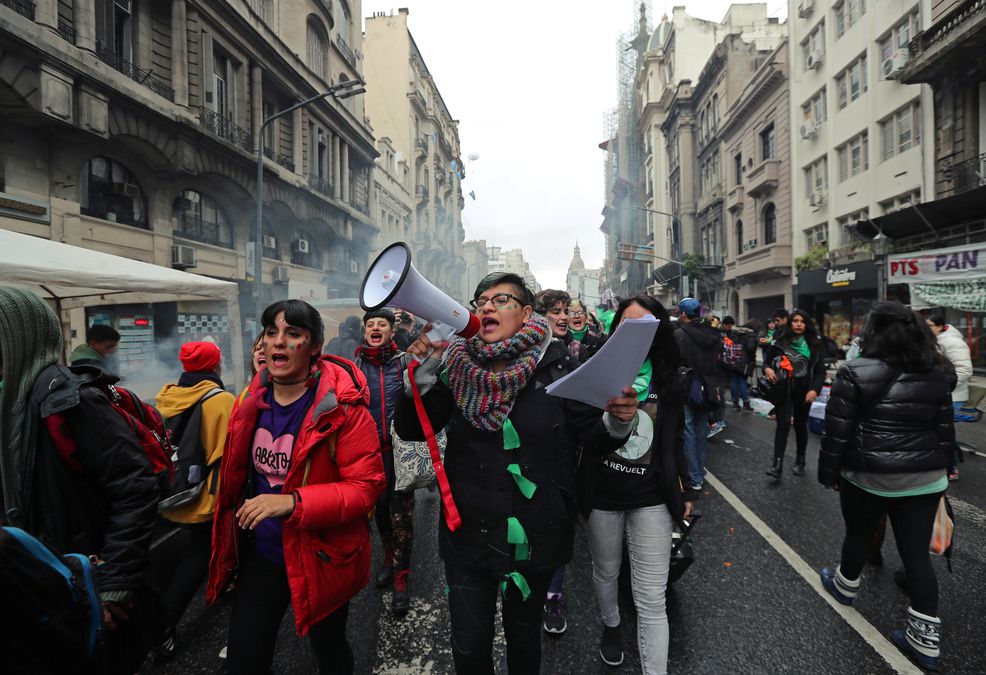 Abortion rights activists gather as lawmakers are expected to vote on a bill legalizing abortion, in Buenos Aires