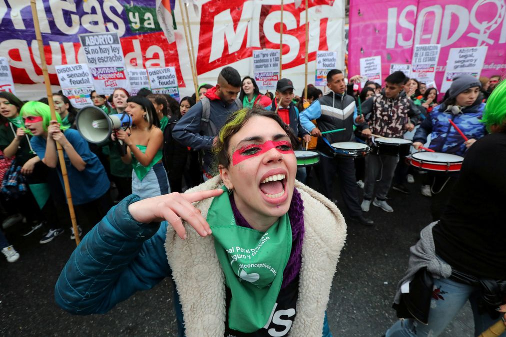 Abortion rights activists gather as lawmakers are expected to vote on a bill legalizing abortion, in Buenos Aires