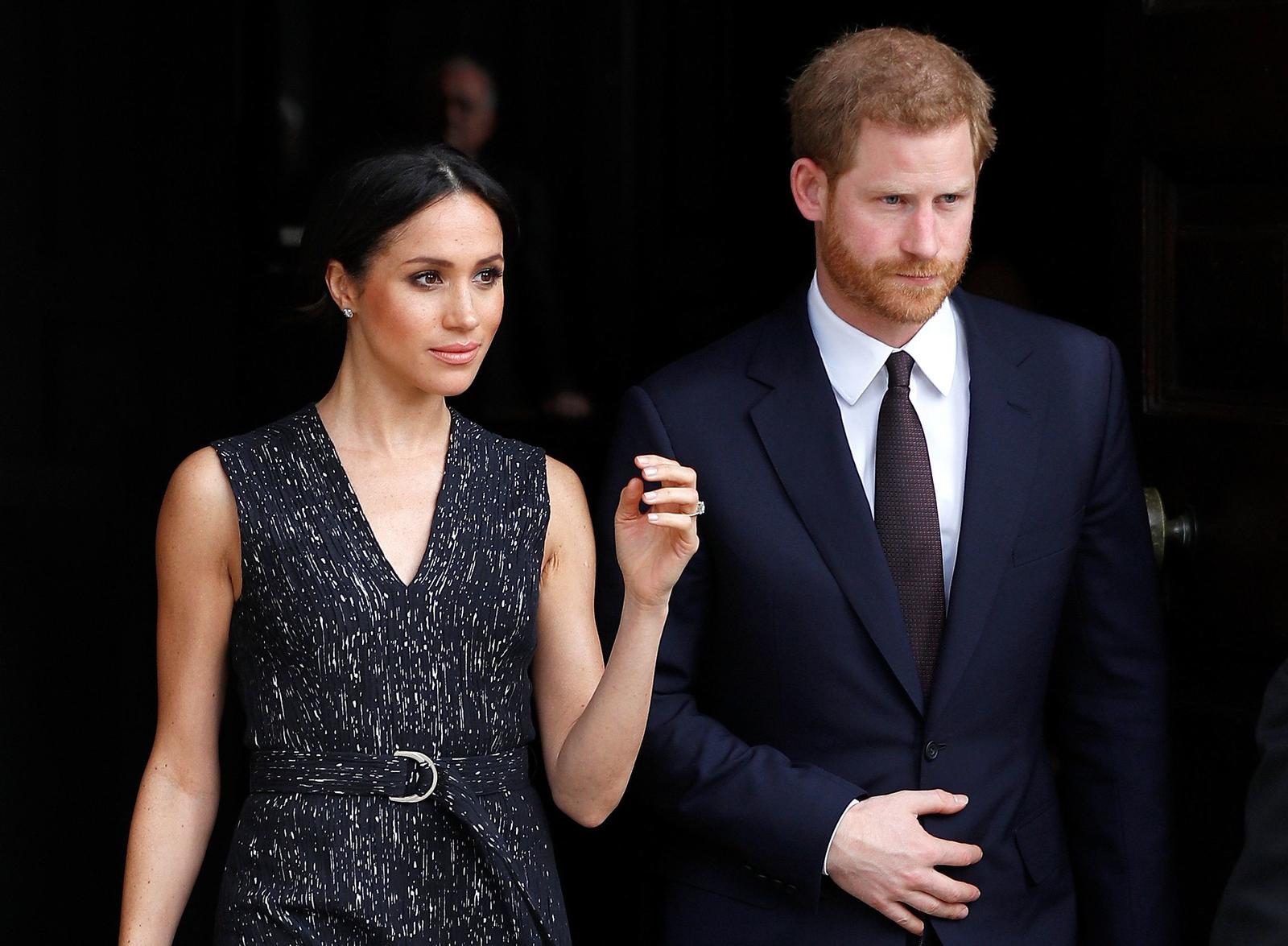 Britain’s Prince Harry and his fiancee Meghan Markle leave a service at St Martin-in-The Fields to mark 25 years since Stephen Lawrence was killed in a racially motivated attack, in London