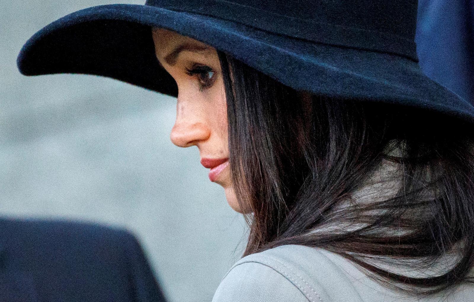 Meghan Markle, the fiancee of Britain’s Prince Harry, attends the Dawn Service at Wellington Arch to commemorate Anzac Day in London