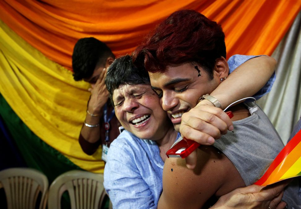 People belonging to the lesbian, gay, bisexual and transgender (LGBT) community celebrate after the Supreme Court’s verdict of decriminalizing gay sex and revocation of the Section 377 law, at an NGO in Mumbai