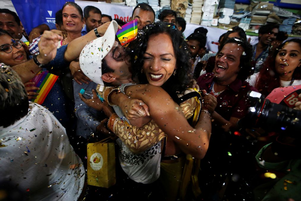 Supporters of the lesbian, gay, bisexual and transgender (LGBT) community celebrate after the Supreme Court’s verdict of decriminalizing gay sex and revocation of the archaic Section 377 law, at an NGO in Mumbai