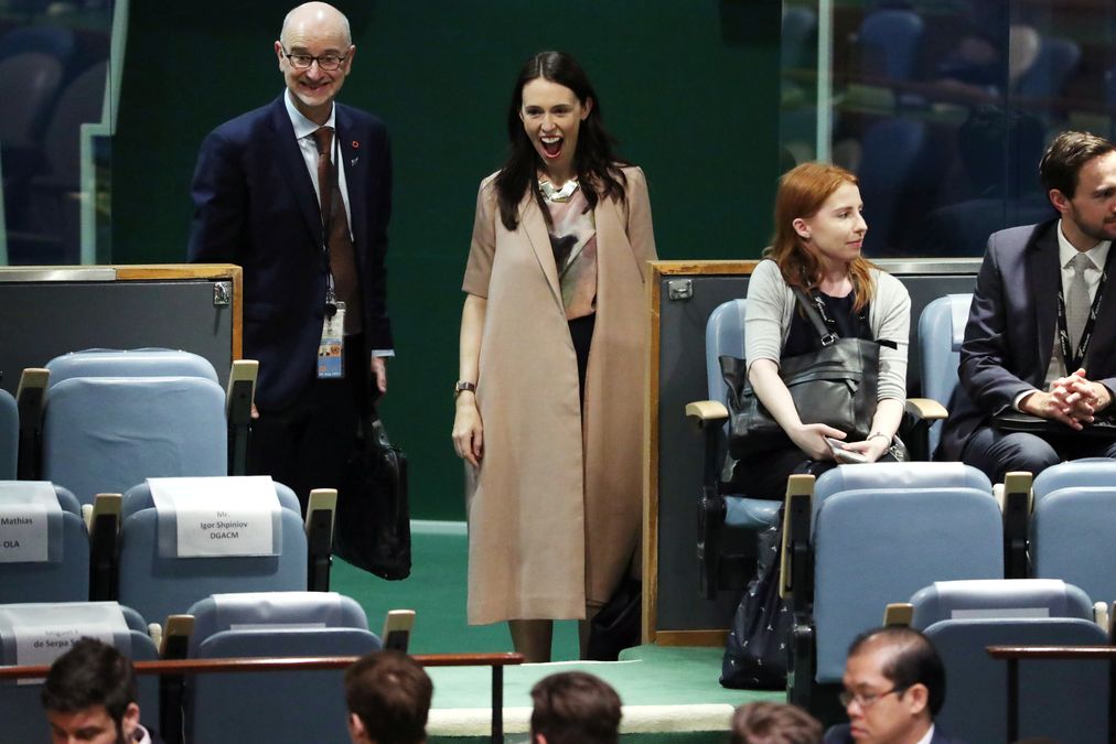 New Zealand Prime Minister Jacinda Ardern reacts as she sees her baby Neve at the Nelson Mandela Peace Summit during the 73rd United Nations General Assembly in New York
