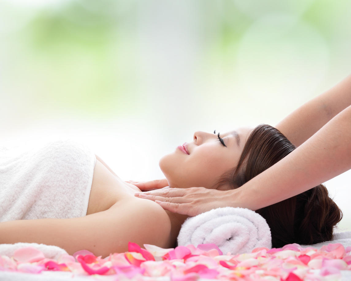 beautiful woman receiving massage