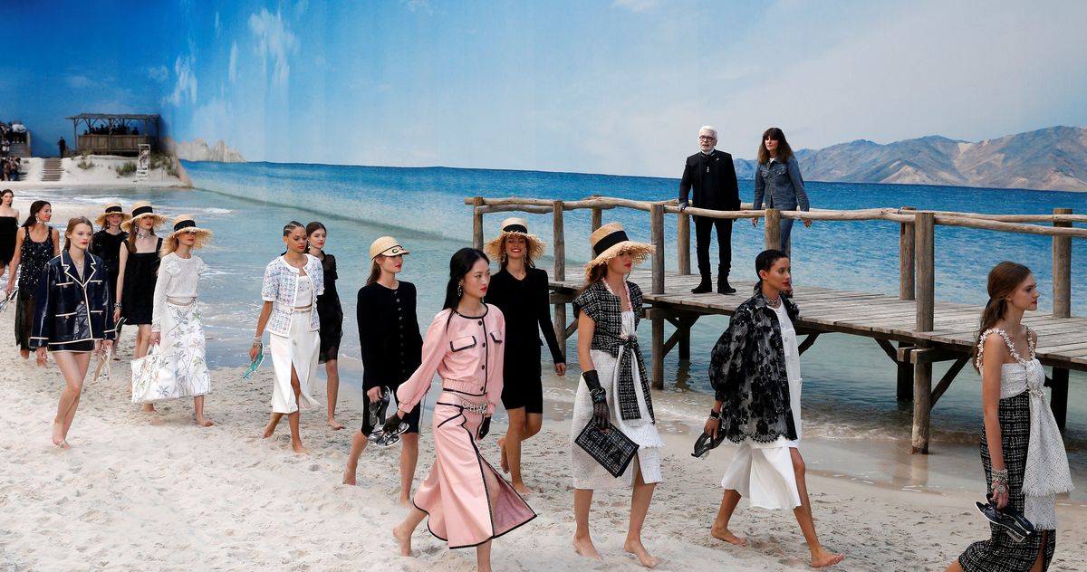 Models present creations by German designer Karl Lagerfeld as part of his Spring/Summer 2019 women’s ready-to-wear collection show for fashion house Chanel during Paris Fashion Week