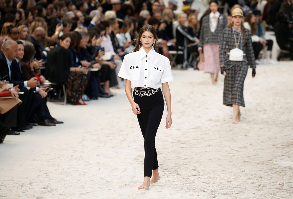 Model Kaia Gerber presents a creation by German designer Karl Lagerfeld as part of his Spring/Summer 2019 women’s ready-to-wear collection show for fashion house Chanel during Paris Fashion Week