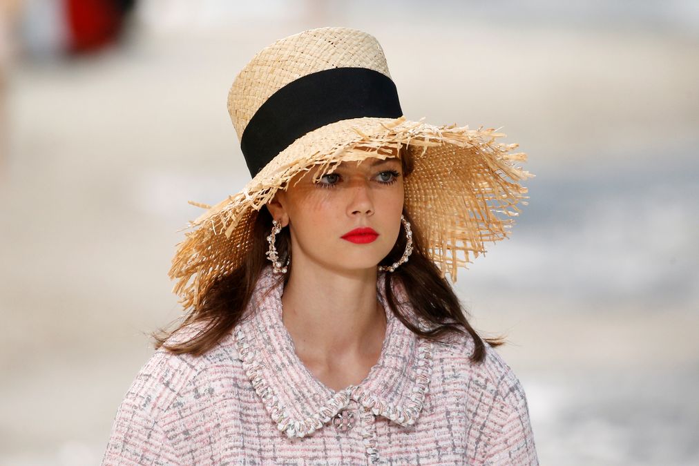 A model presents a creation by German designer Karl Lagerfeld as part of his Spring/Summer 2019 women’s ready-to-wear collection show for fashion house Chanel during Paris Fashion Week