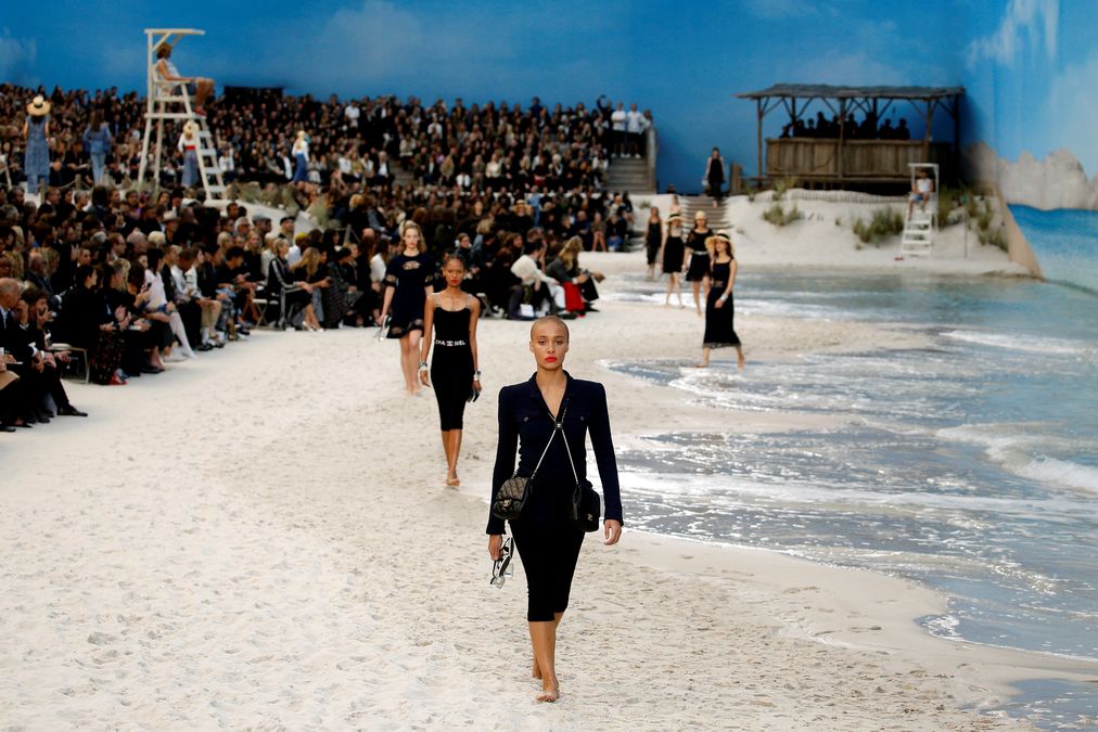 Models present creations by German designer Karl Lagerfeld as part of his Spring/Summer 2019 women’s ready-to-wear collection show for fashion house Chanel during Paris Fashion Week