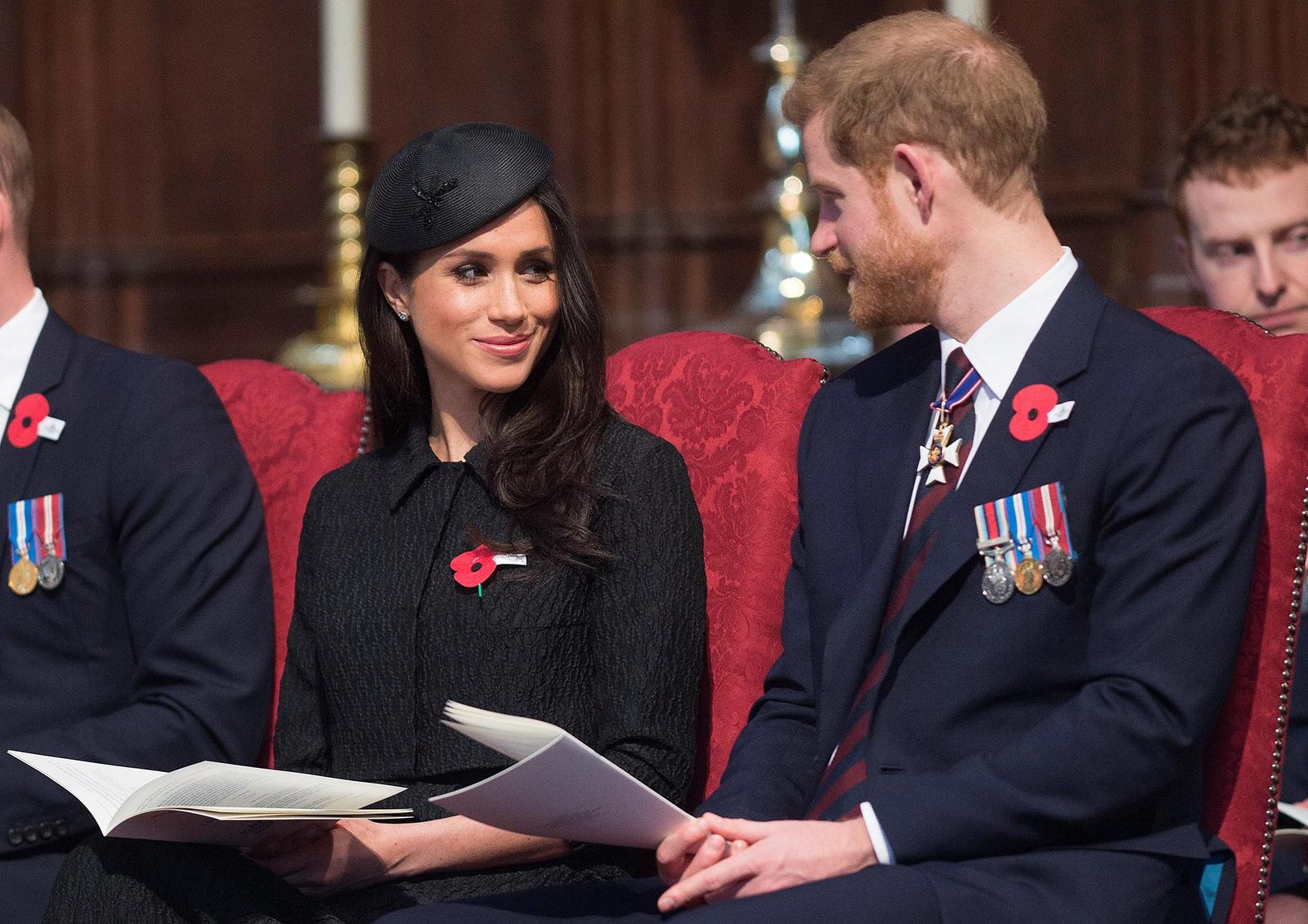 Britain’s Prince Harry and his fiancee Meghan Markle attend a Service of Thanksgiving and Commemoration on ANZAC Day at Westminster Abbey in London