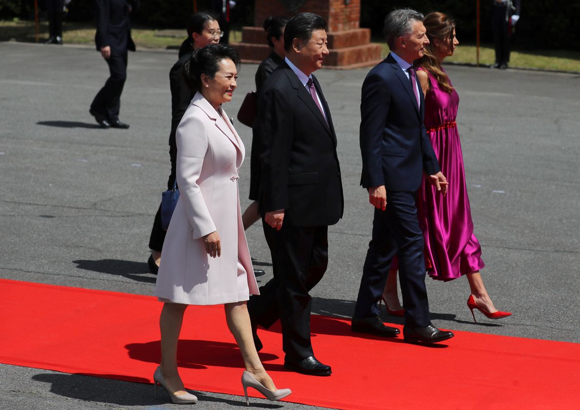 Argentina’s President Mauricio Macri and first lady Juliana Awada receive China’s President Xi Jinping and his wife Peng Liyuan at the Olivos Presidential Residence in Buenos Aires