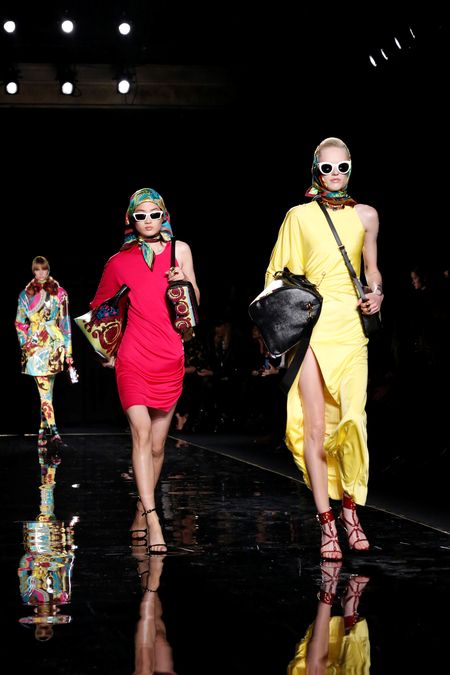 Models present creations during the Versace presentation in New York