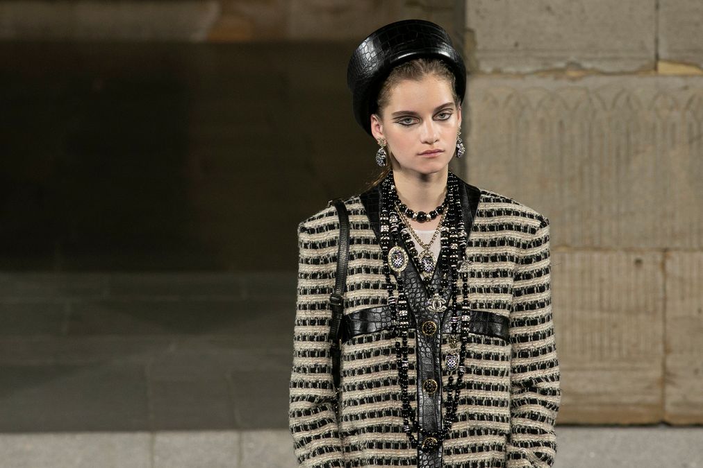 A model presents a creation during the CHANEL Paris New York Métiers d’art 2018/19 Show at Metropolitan Museum of Art in New York