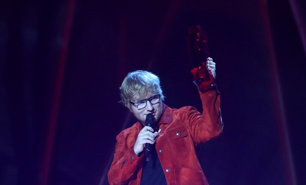Ed Sheeran accepts the award for global success at the Brit Awards at the O2 Arena in London