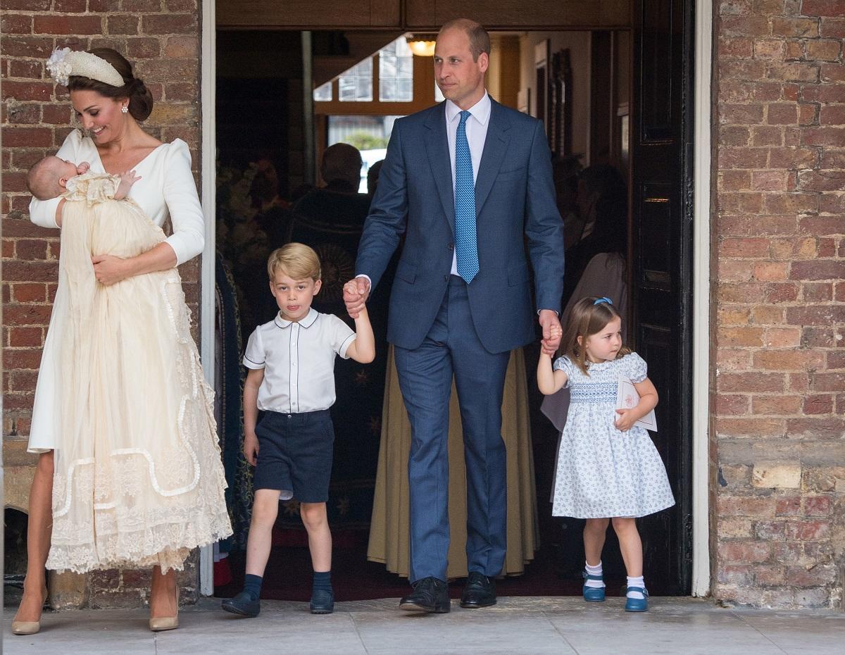 Britain’s Prince William and Catherine, the Duchess of Cambridge, leave the chapel with their children Prince George, Princess Charlotte and Prince Louis after Prince Louis’s christening in the Chapel Royal, St James’s Palace, London