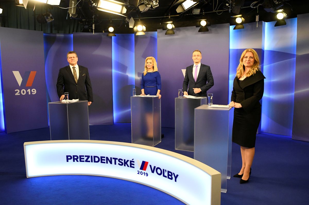 Slovakia’s presidential candidates Zuzana Caputova and Maros Sefcovic get ready for a televised debate ahead of an election run-off, at TV Markiza studio in Bratislava