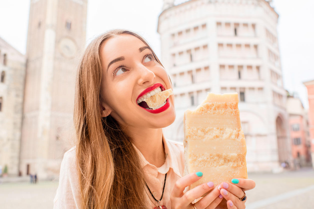 Woman with parmesan cheese in Parma