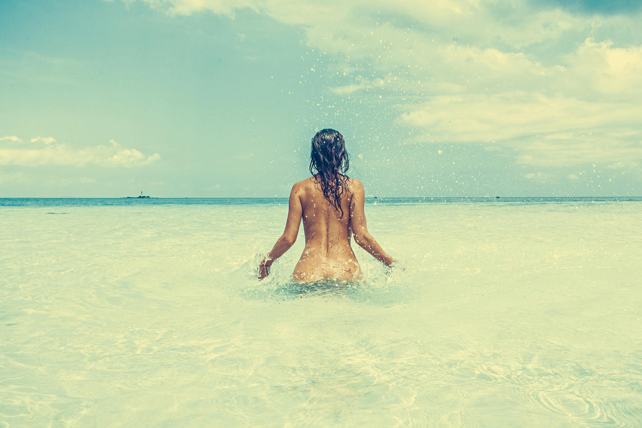 Nude Woman at tropical beach