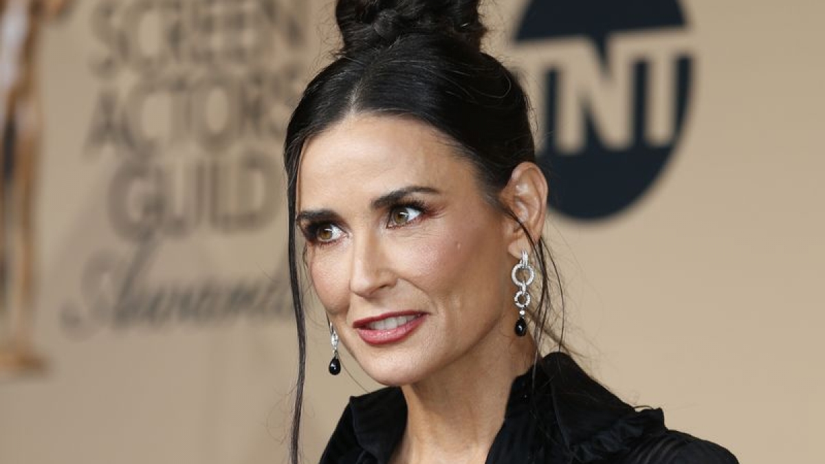 Presenter Demi Moore poses backstage at the 22nd Screen Actors Guild Awards in Los Angeles