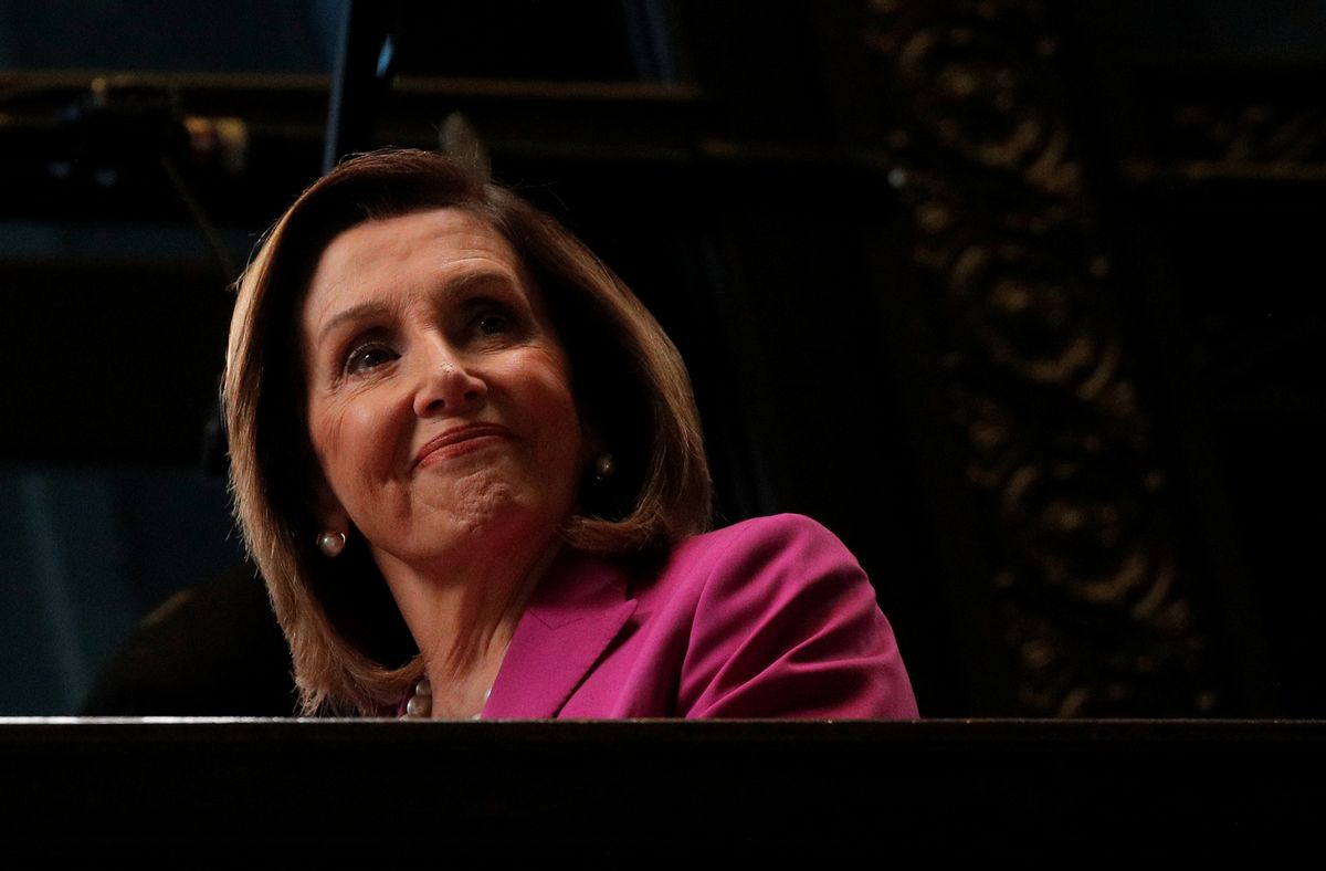 U.S. House Speaker Nancy Pelosi (D-CA) looks down from a balcony during an interview with CNBC at the NYSE in New York