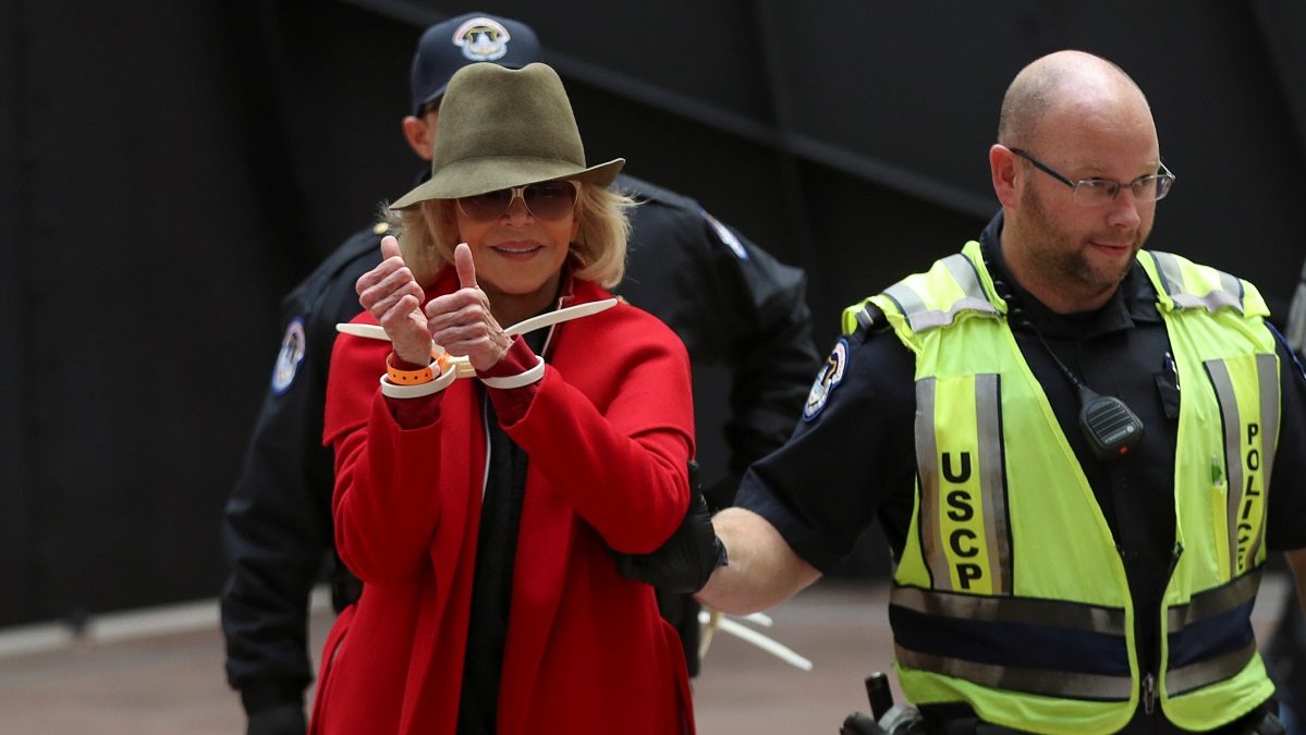 Actress Jane Fonda is arrested by U.S. Capitol Police officers during a 